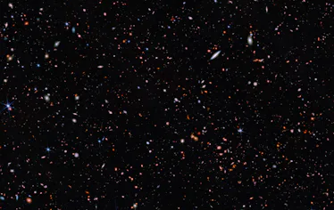 Galaxies of different sizes sparkle across this image. Some are much larger, because they are closer...