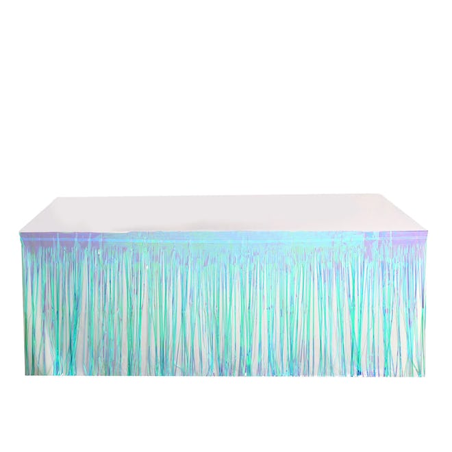 When choosing mermaid birthday party decorations, you need a blue fringe table skirt of course.