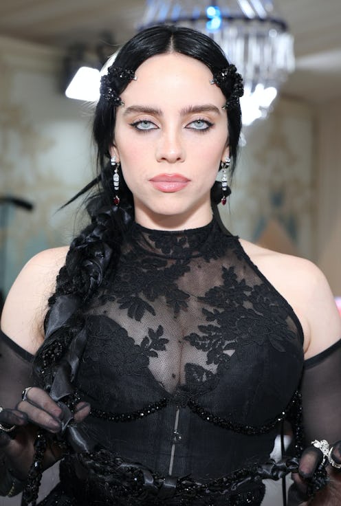 Billie Eilish wears a sheer black dress to attend the 2023 Met Gala.