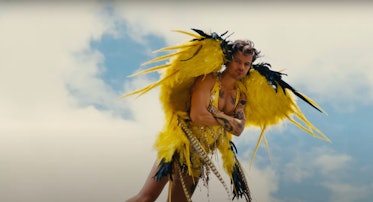Harry Styles wears a custom Ed Marler yellow jumpsuit during his "Daylight" music video