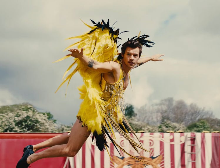 Harry Styles wears a custom Ed Marler yellow jumpsuit during his "Daylight" music video