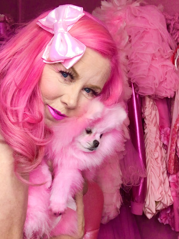 Kitten Kay Sera with her pink Pomeranian, Pinky.