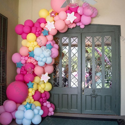 Pink, yellow, and blue balloon arch with star balloons, a perfect addition to your malibu barbie bir...