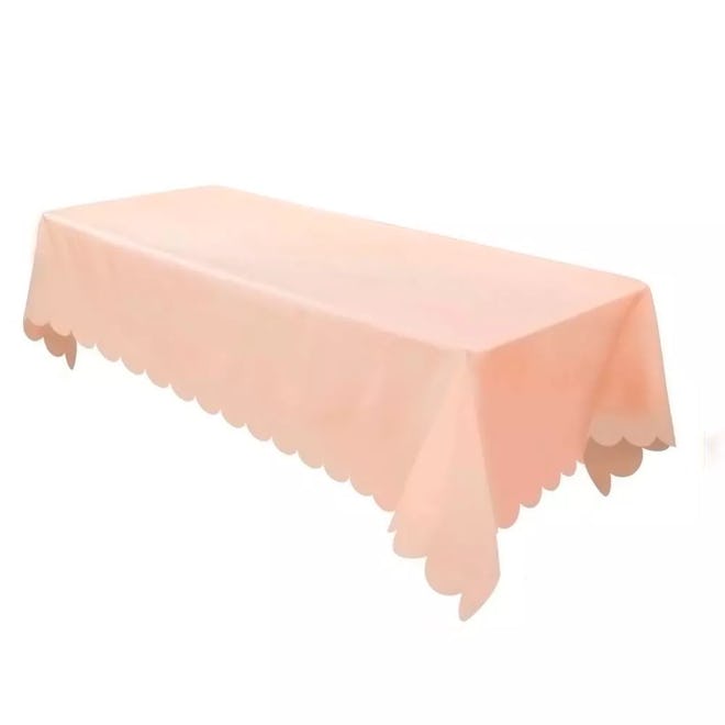 Coral scalloped egde tablecloth, the perfect addition to 70s birthday party decorations