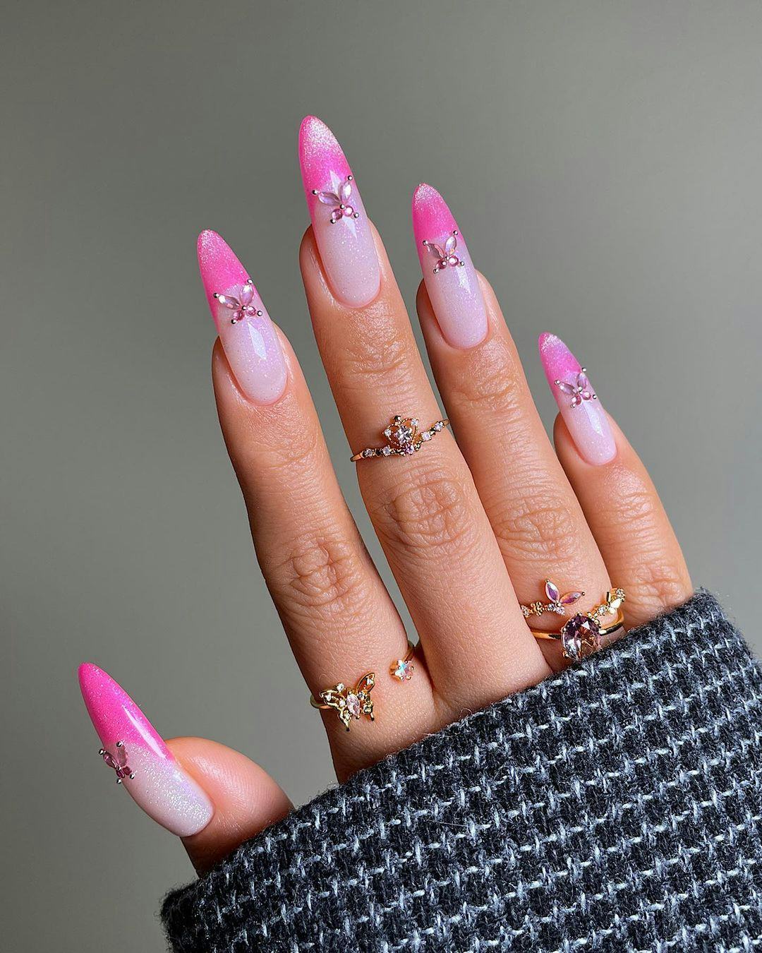 For nail designs inspired by your zodiac sign, hot pink French tips with glitter are one of the best...