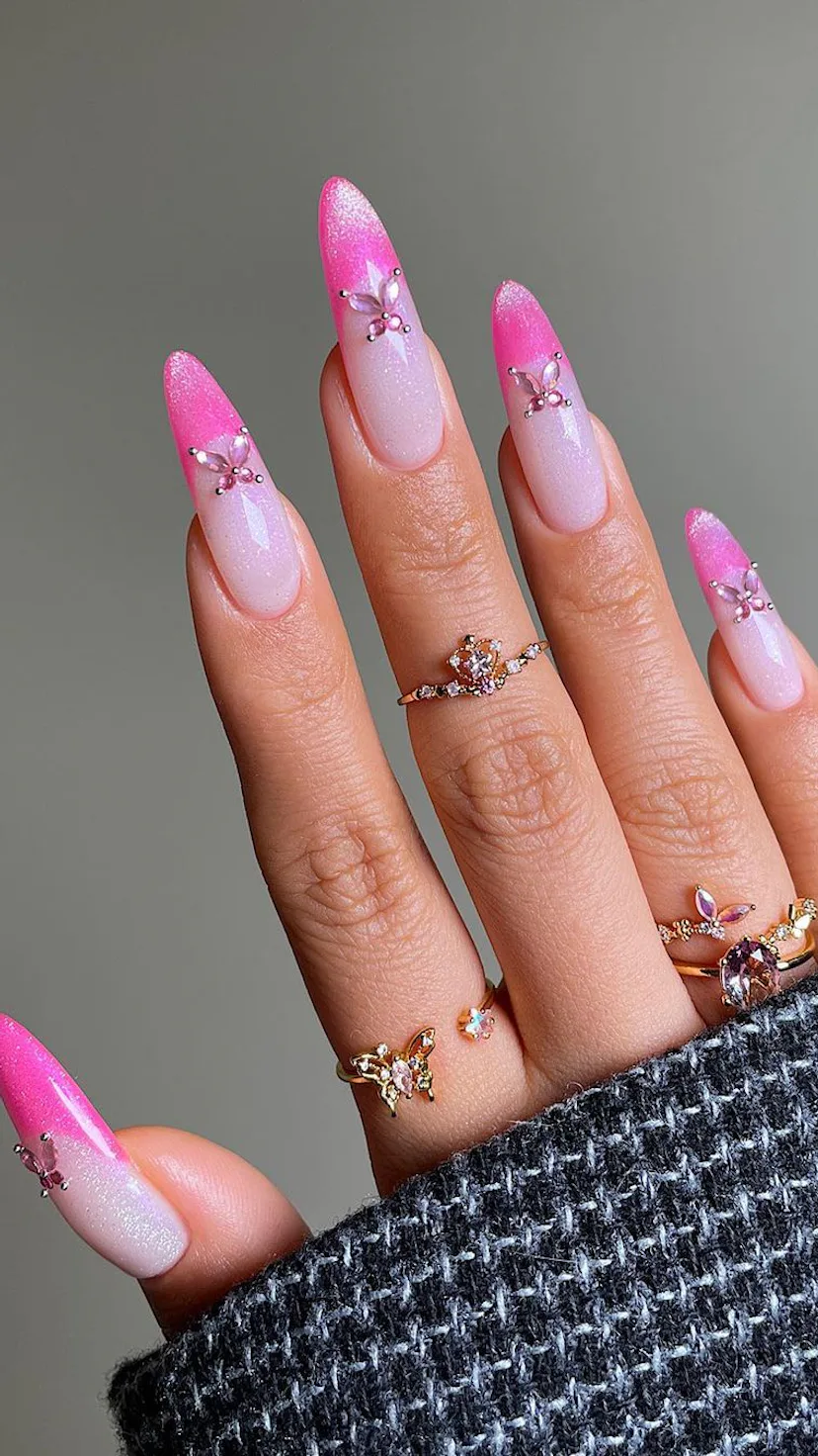 For nail designs inspired by your zodiac sign, hot pink French tips with glitter are one of the best...