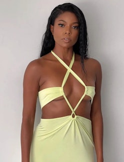 Gabrielle Union wet look waves and green cutout dress