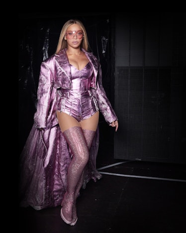 Beyoncé wears a custom Acne Studios bustier, shorts, and jacket during her 'Renaissance' world tour.