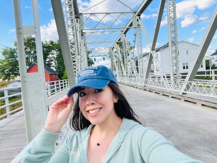 The writer takes a photo on the One Tree Hill bridge in Wilmington.