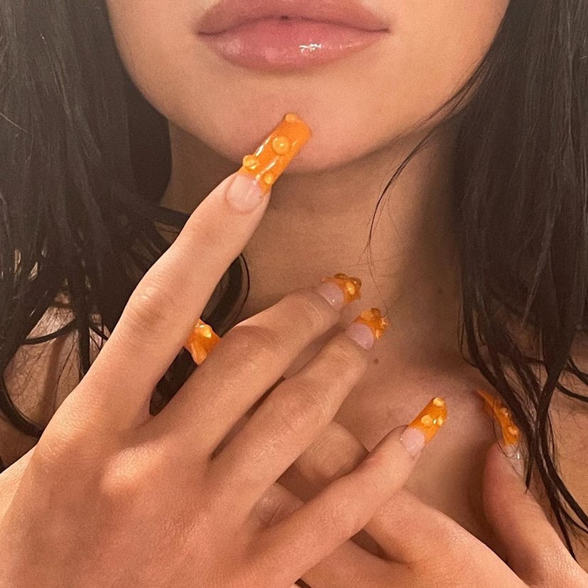 Kylie Jenner orange french tip nails