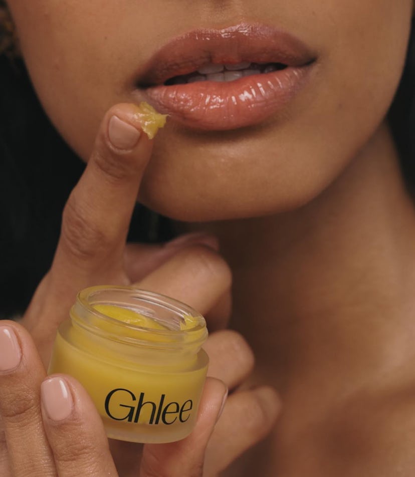 Model puts Ghlee on lips for a hydrated and soft look and feel