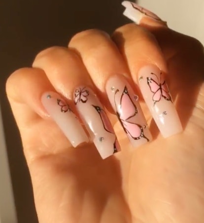 Kylie Jenner pink butterfly nail art