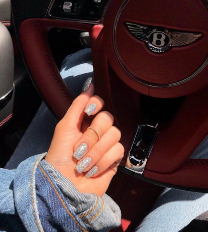 Kylie Jenner silvery holographic glitter nails