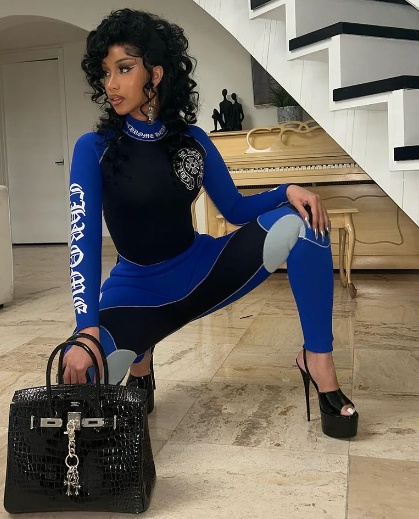 Cardi B's Curly 'Mullet' Is Introducing Gen Z To An '80s Classic