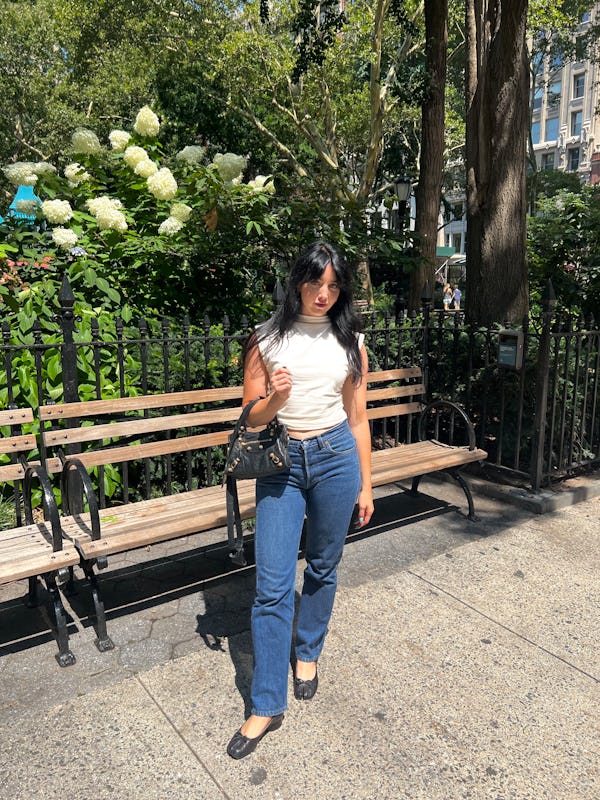 bustle senior lifestyle & beauty editor rachel lapidos wears reformation’s lindy knit top in white