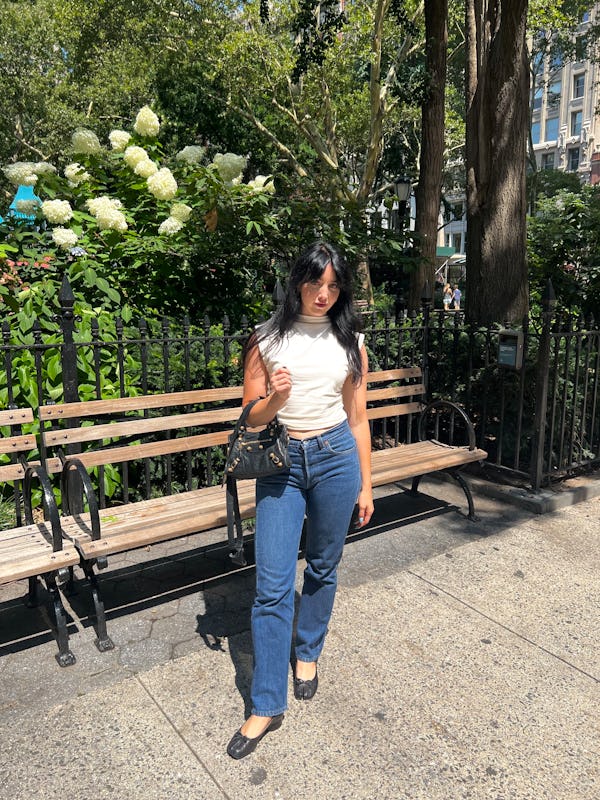 bustle senior lifestyle & beauty editor rachel lapidos wears reformation's lindy knit top in white