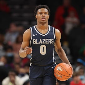 Bronny James #0 of the Sierra Canyon Trailblazers handles the ball during the Hoophall West tourname...