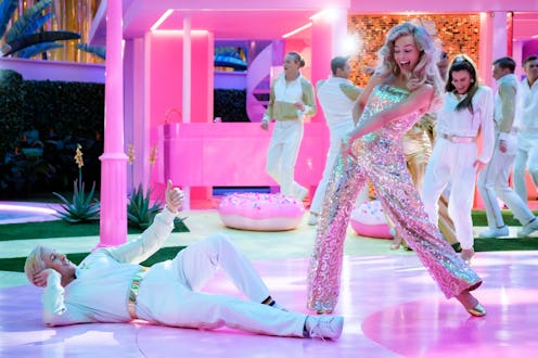 RYAN GOSLING as Ken and MARGOT ROBBIE as Barbie in Warner Bros. Pictures’ “BARBIE,” a Warner Bros. P...