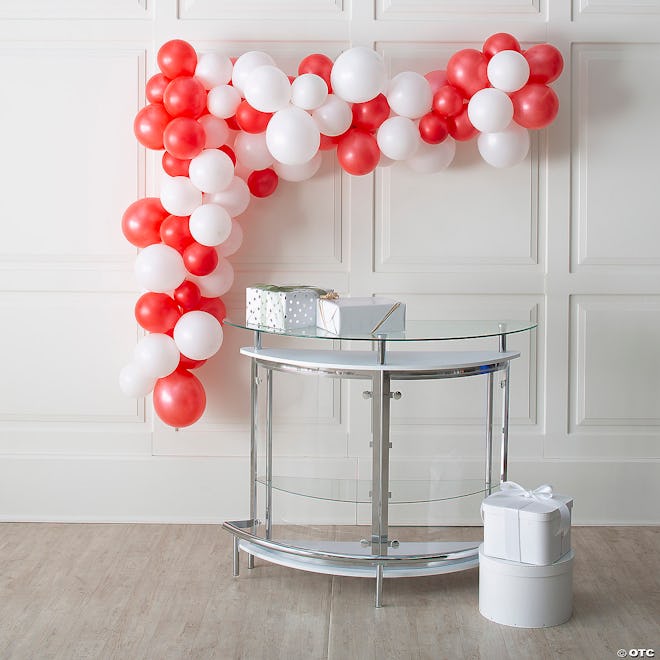 A red an white balloon garland kit, perfect for decorating a kids target birthday party.