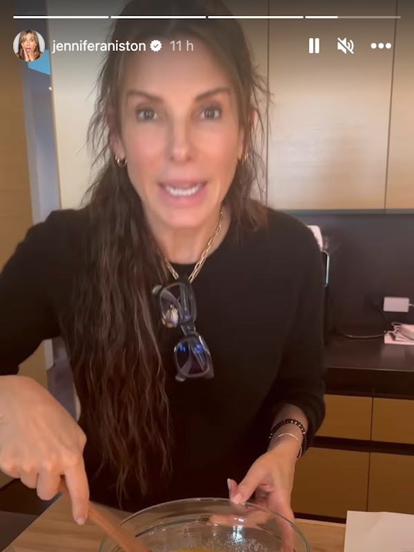 Sandra Bullock baking on Jennifer Aniston’s Instagram Story.