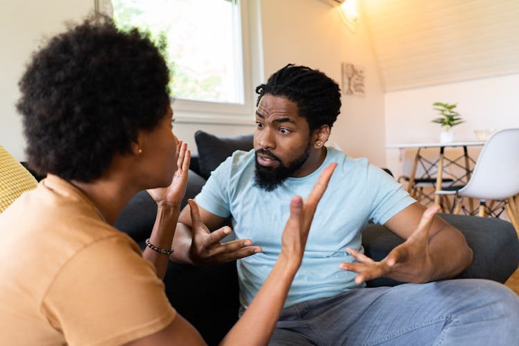 Man and woman having a heated argument at home