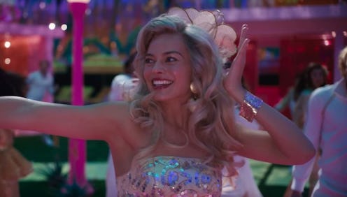 Margot Robbie dances to fitting lyrics from Dua Lipa's "Dance the Night" in the 'Barbie' movie.