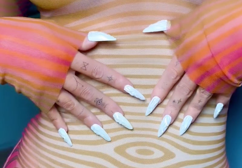 Megan Fox white textured 3D nails