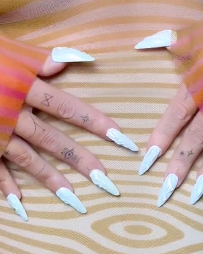 Megan Fox white textured 3D nails