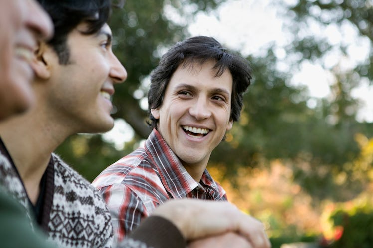 Middle aged men laughing and hanging out