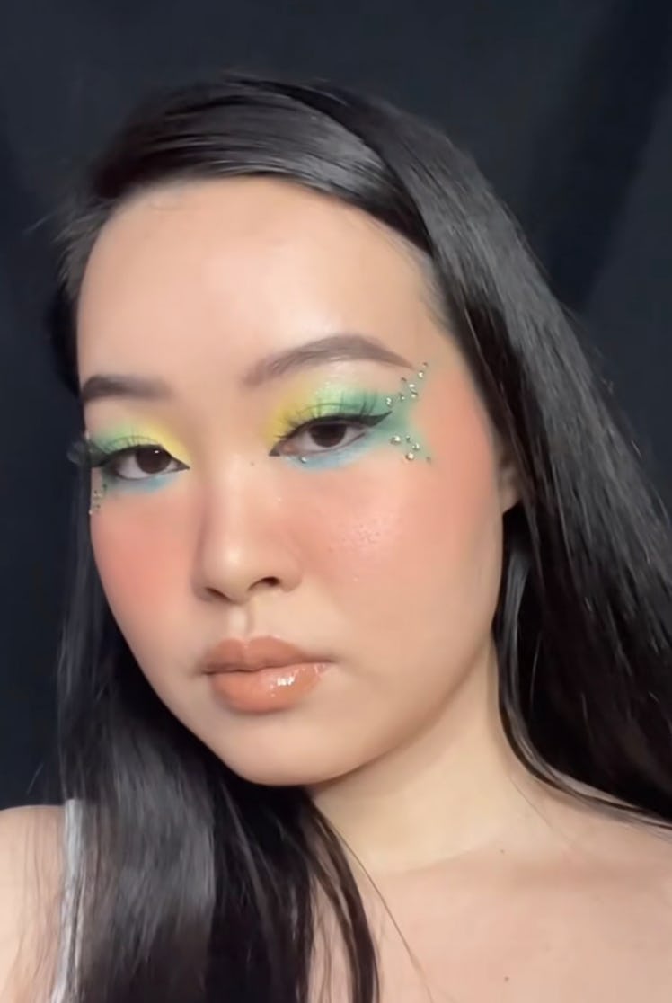 A Swiftie shares a Taylor Swift Eras Tour makeup idea inspired by her debut album with colorful eyes...