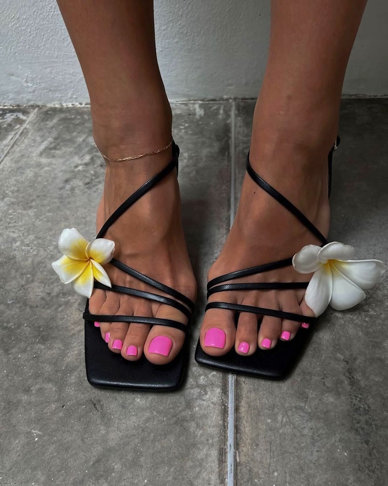 The best pedicure color for each zodiac sign, according to an astrologer.