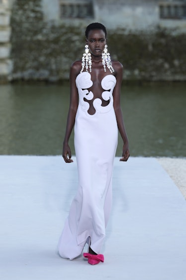 A model walks the runway during the Valentino Haute Couture Fall/Winter 2023/2024 show as part of...