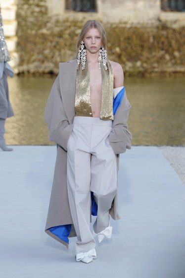 A model walks the runway during the Valentino Haute Couture Fall/Winter 2023/2024 show as part of...