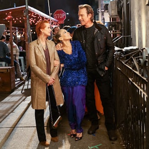 Cynthia Nixon, John Corbett, and Sarah Jessica Parker film a scene for And Just Like That