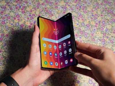 Samsung Galaxy Z Fold 4 foldable display held in a hand