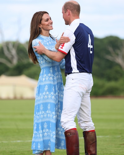  Kate Middleton and Prince William embrace after the Royal Charity Polo Cup 2023 at Guards Polo Club