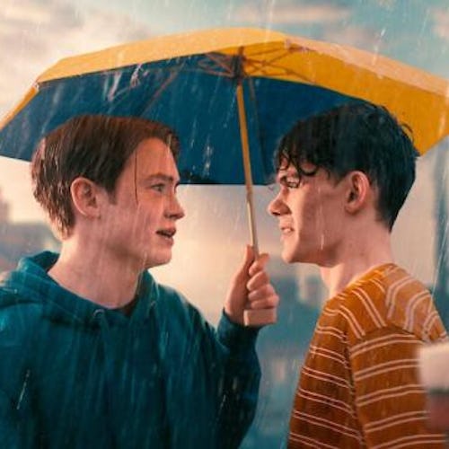 Heartstopper opening scene of nick holding umbrella for charlie