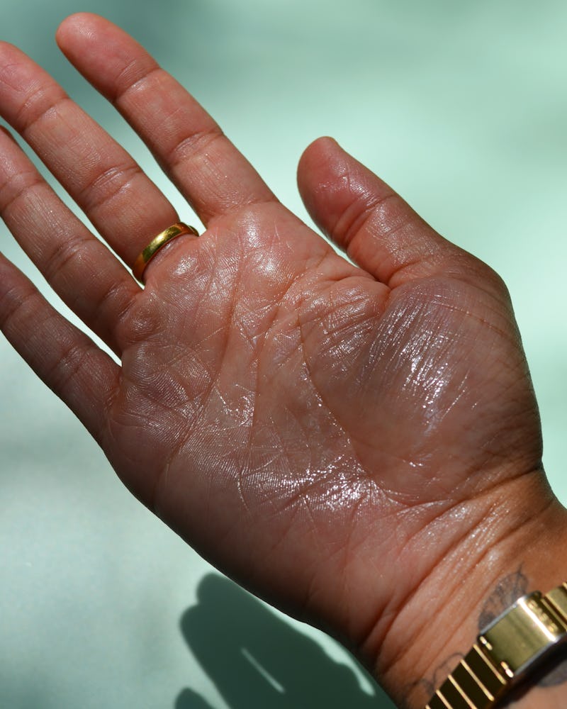A image of a hand swatched with the Cay Skin Isle Nourishing Body Mist SPF 50.