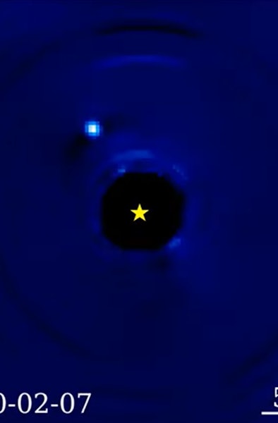 image of a small blue dot orbiting a star icon on a blue and black starry background