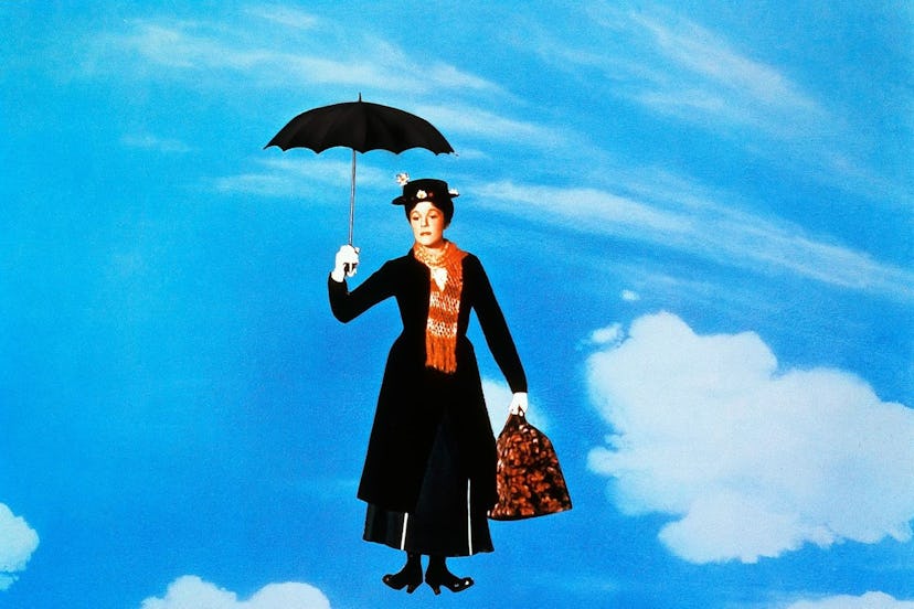 Mary Poppins flying through the air with her umbrella and bag.
