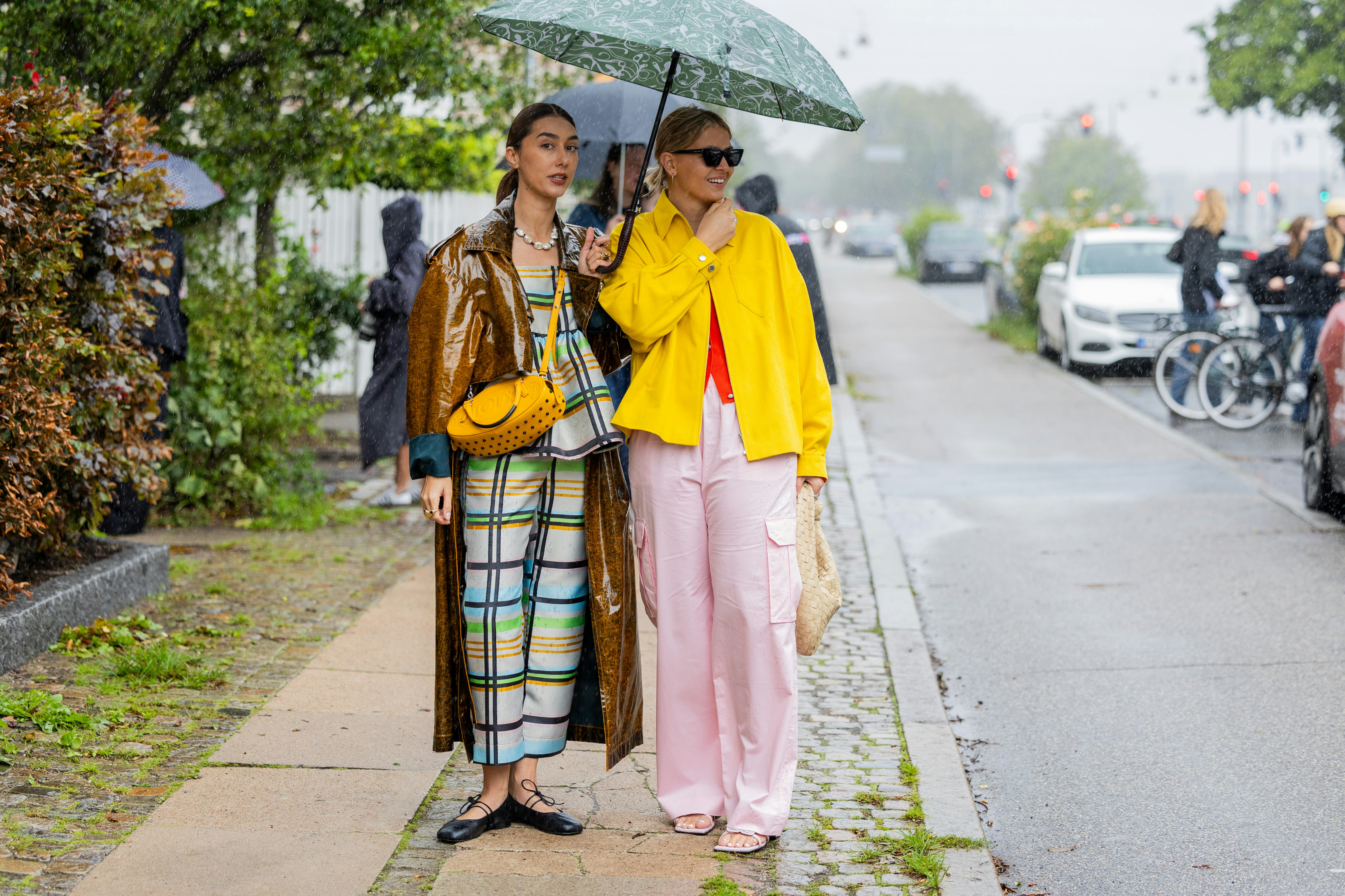 Two guests at Copenhagen fashion week wearing bright colors