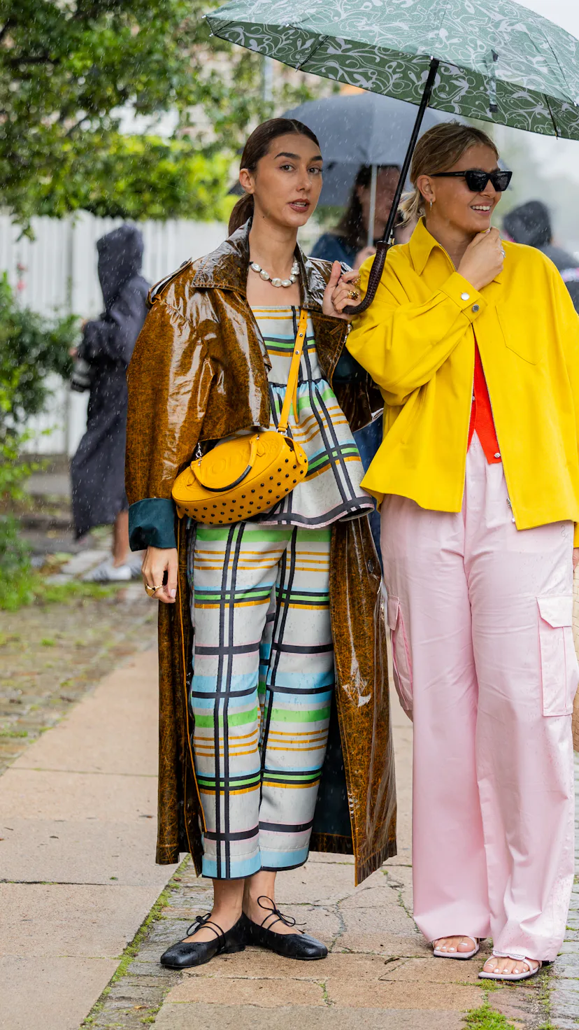 Two guests at Copenhagen fashion week wearing bright colors