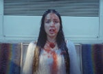 Olivia Rodrigo's "bad idea right?" music video references several teen shows and movies.