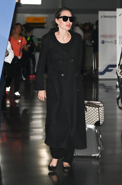 Via Fashion - Angelina Jolie's airport style looks comfortable and relaxed  while still rocking a signature look. Check out her Best Airport Style