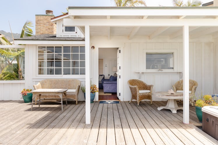 Mila Kunis and Ashton Kutcher will greet you at their Airbnb beach house. 