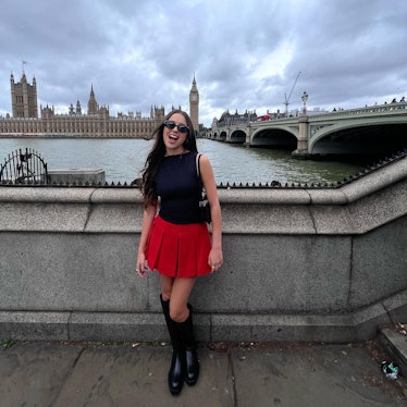 Olivia Rodrigo wears a pleated red Patou mini skirt and black tank top in a photo posted to her Inst...