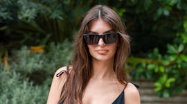 Emily Ratajkowski in a classic black bikini thongkini.