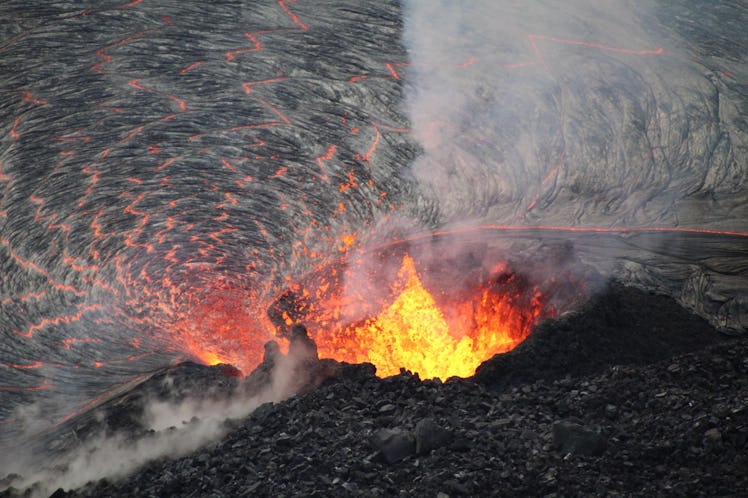 a volcano in hawaii seen up close with magma erupting 