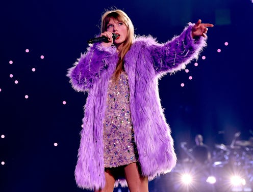 Taylor Swift performing at the 'Eras Tour' in 2023.
