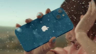 iPhone 14 being splashed on